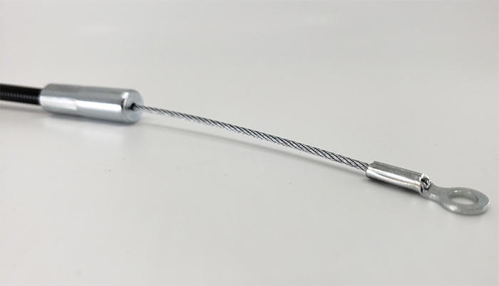 Stainless steel push-pull aircraft cable assembly with an eyelet end fitting.