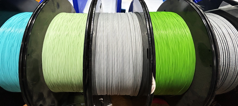 Assorted nylon, vinyl, and FEP coated mechanical cable